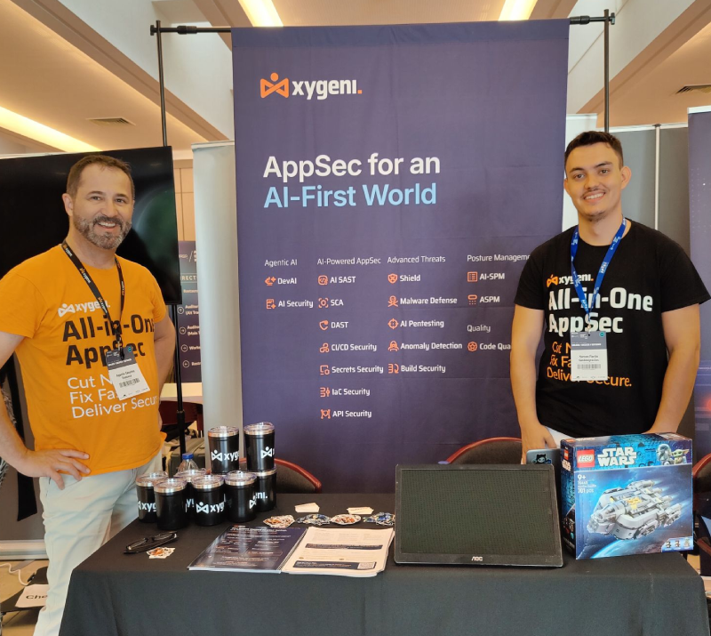 Agustín Sánchez and Marcos Martin at the Xygeni booth, OWASP AppSec Days Portugal 2026 in Porto